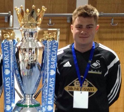 Ceri Phillips poses with the Premier League Trophy Ceri Phillips poses with the Premier League Trophy